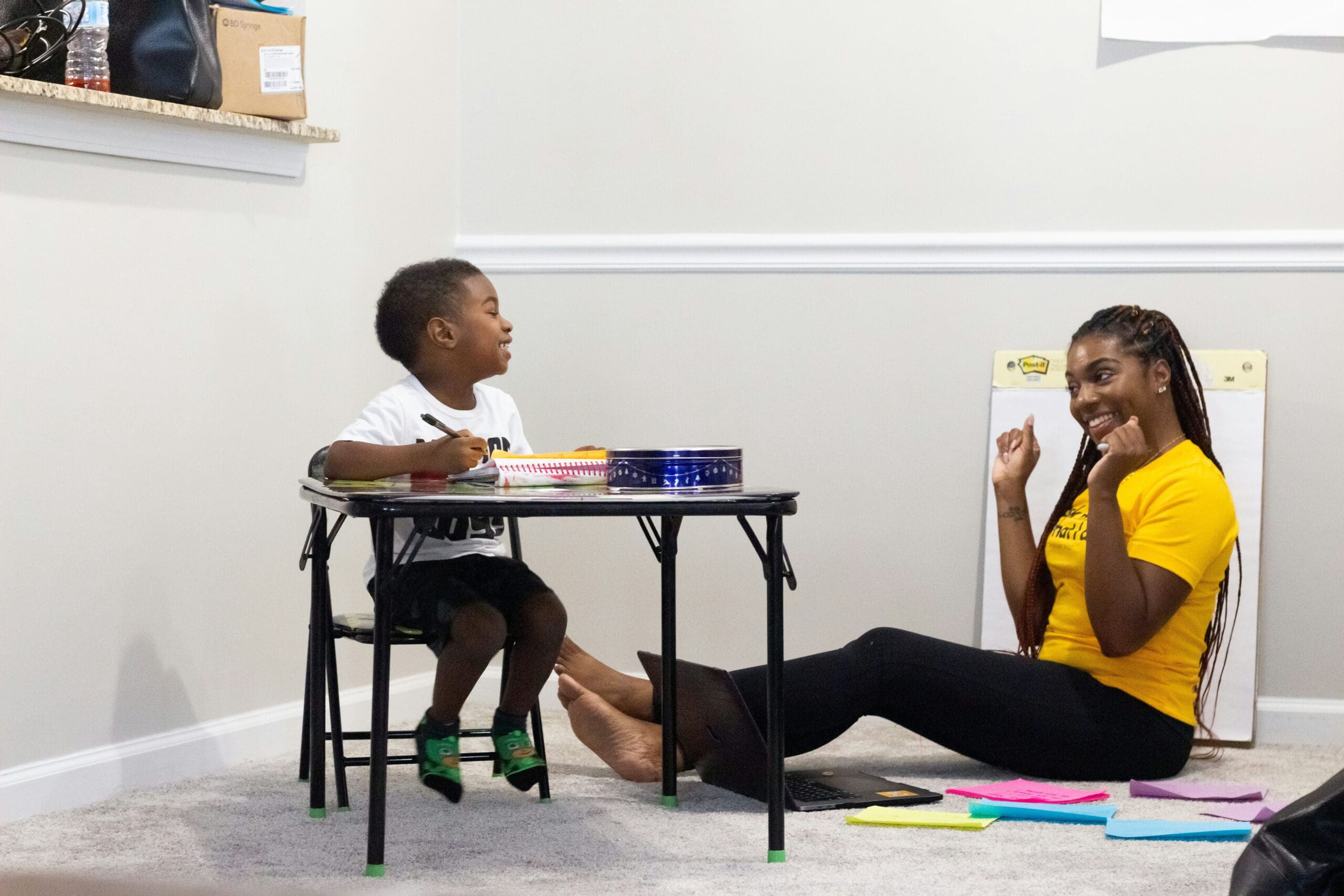 teacher helping special needs student with extra support through ElevatED.